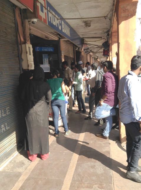 waiting in line at the bank